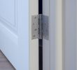 How do I fix a squeaky door?